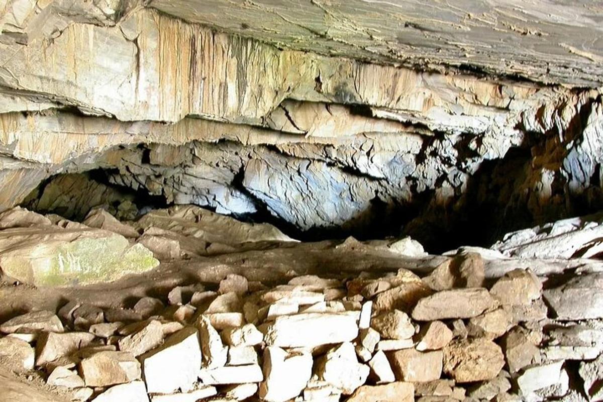 a cave filled with rocks and a cave