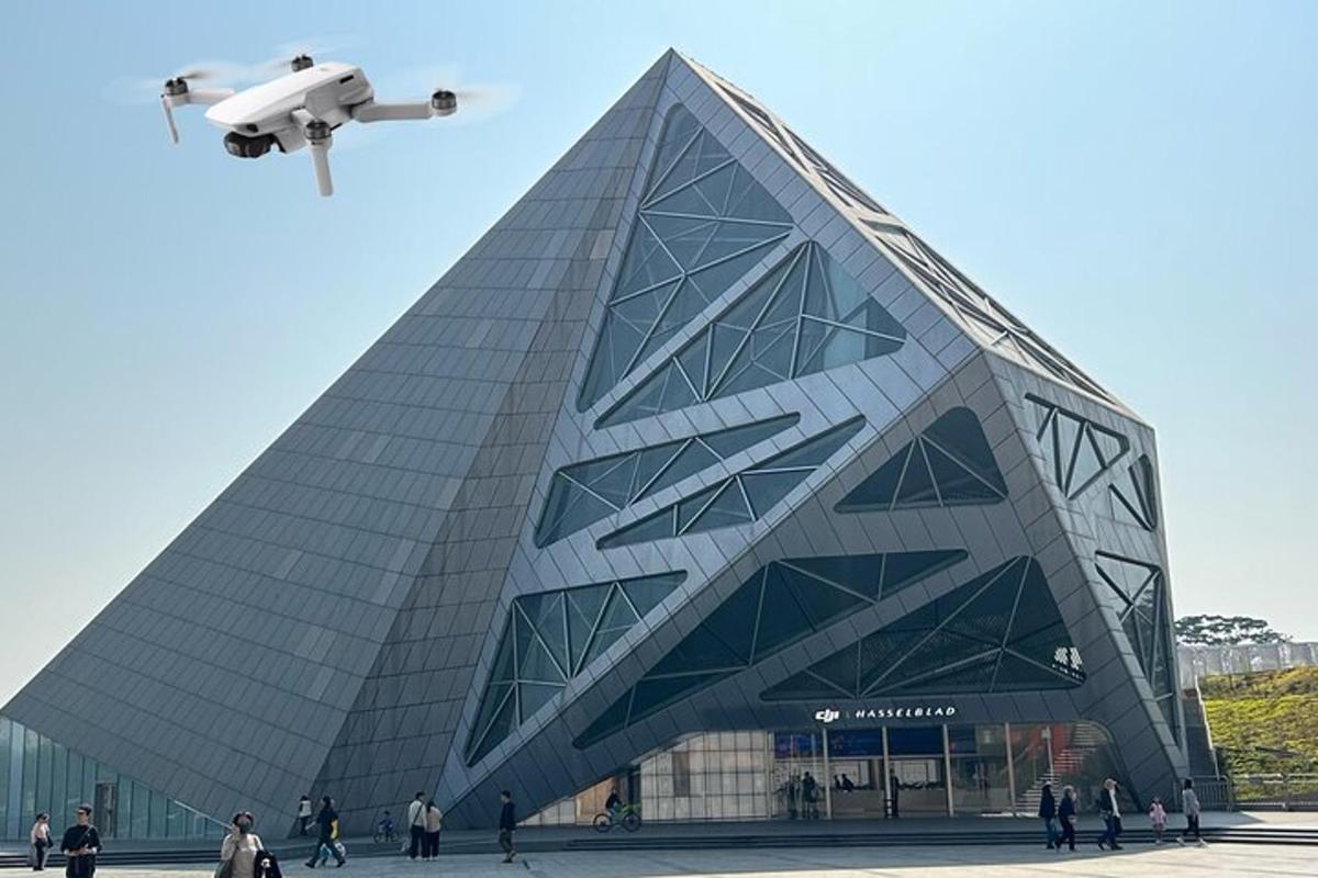 a drone flying in front of a building
