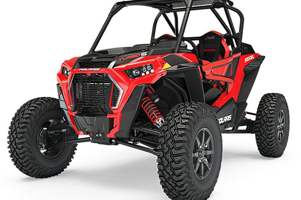 a red and black atv on a white background