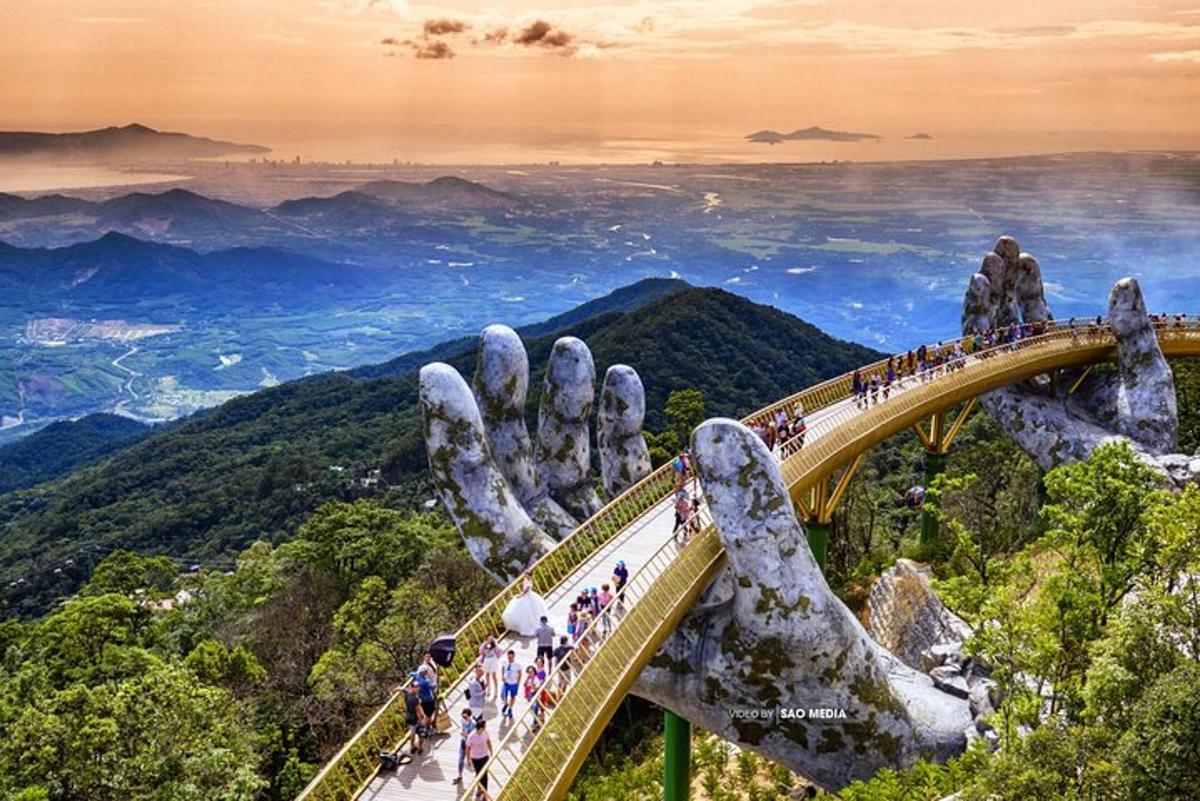a group of people on a bridge with a raised hand