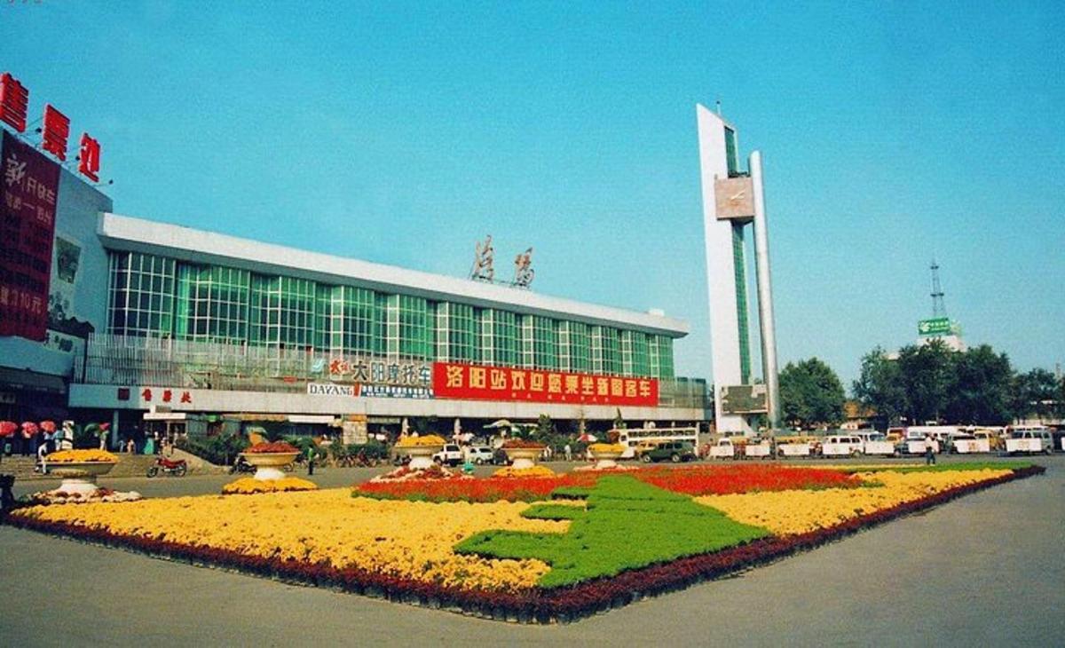 a building with a large display of flowers in front of it
