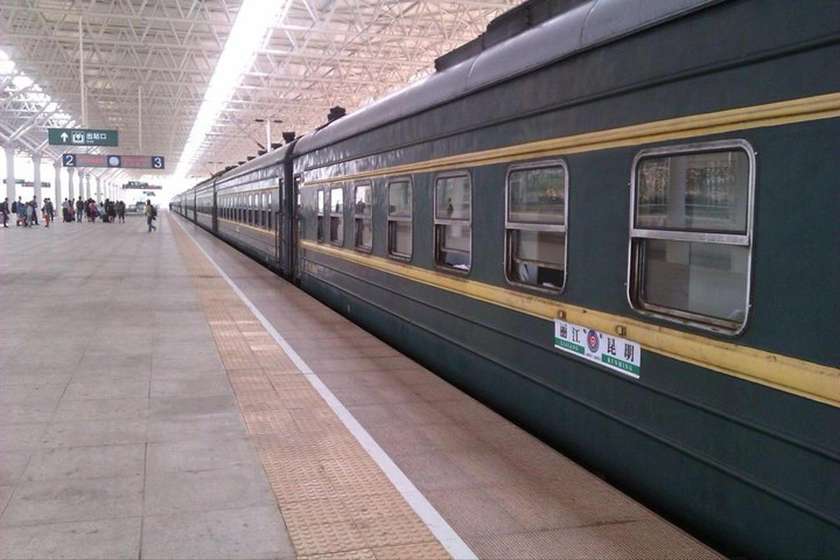 a train at a train station with a platform