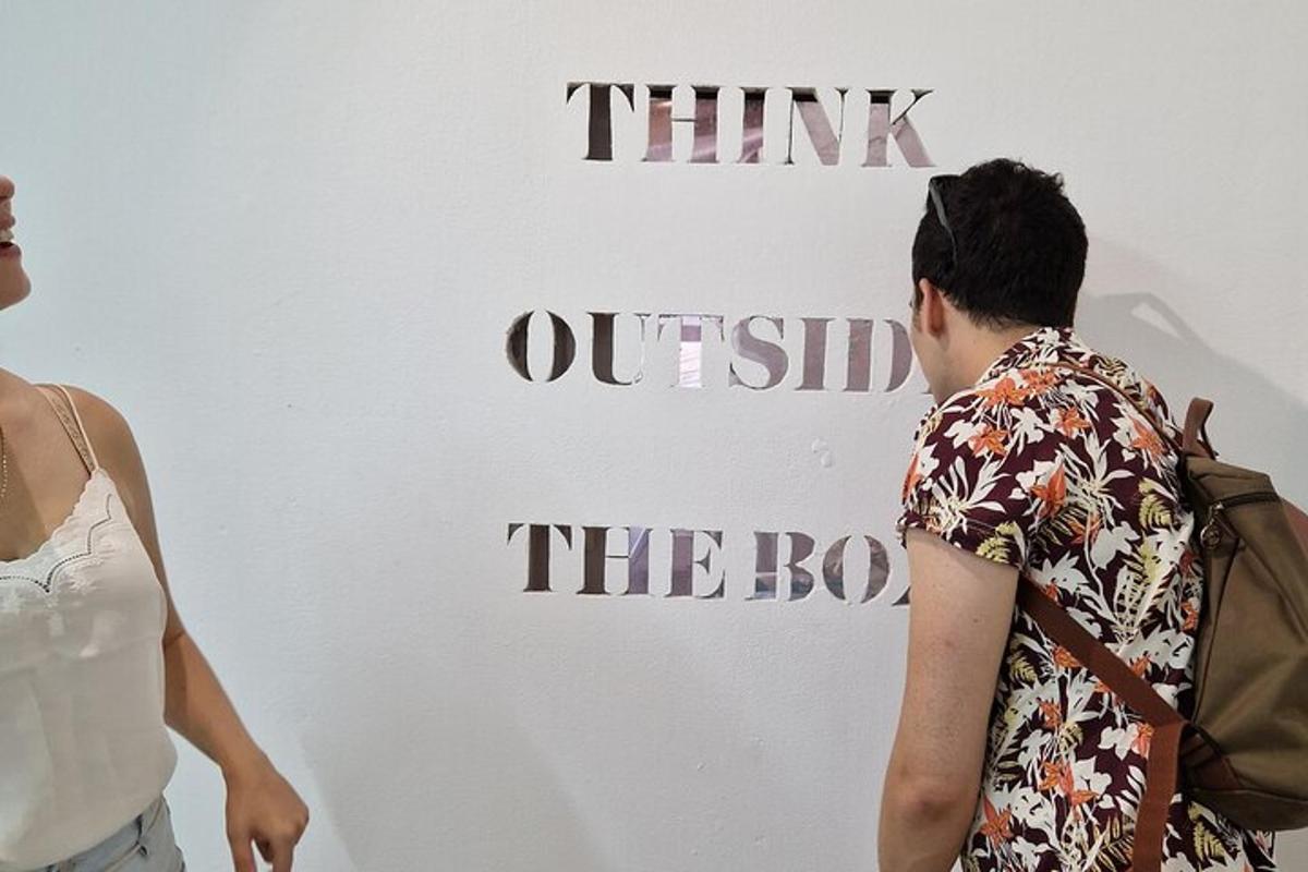 a man standing next to a woman looking at a sign