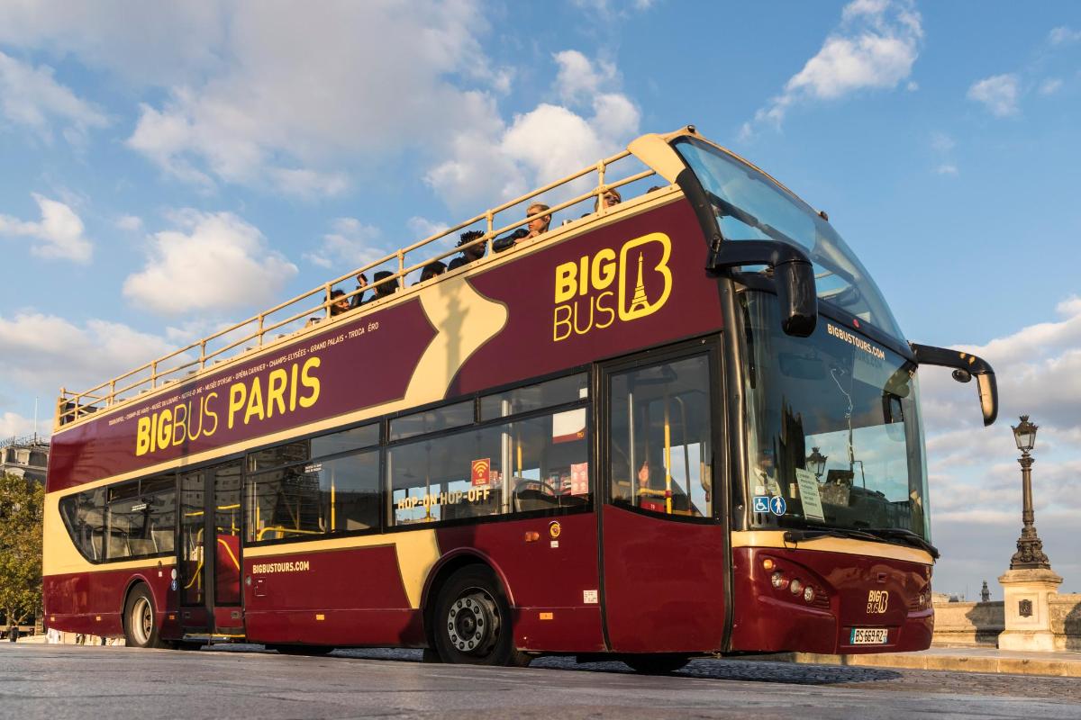 a double decker bus parked in a parking lot
