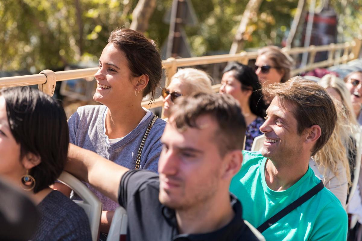 a group of people sitting in a crowd