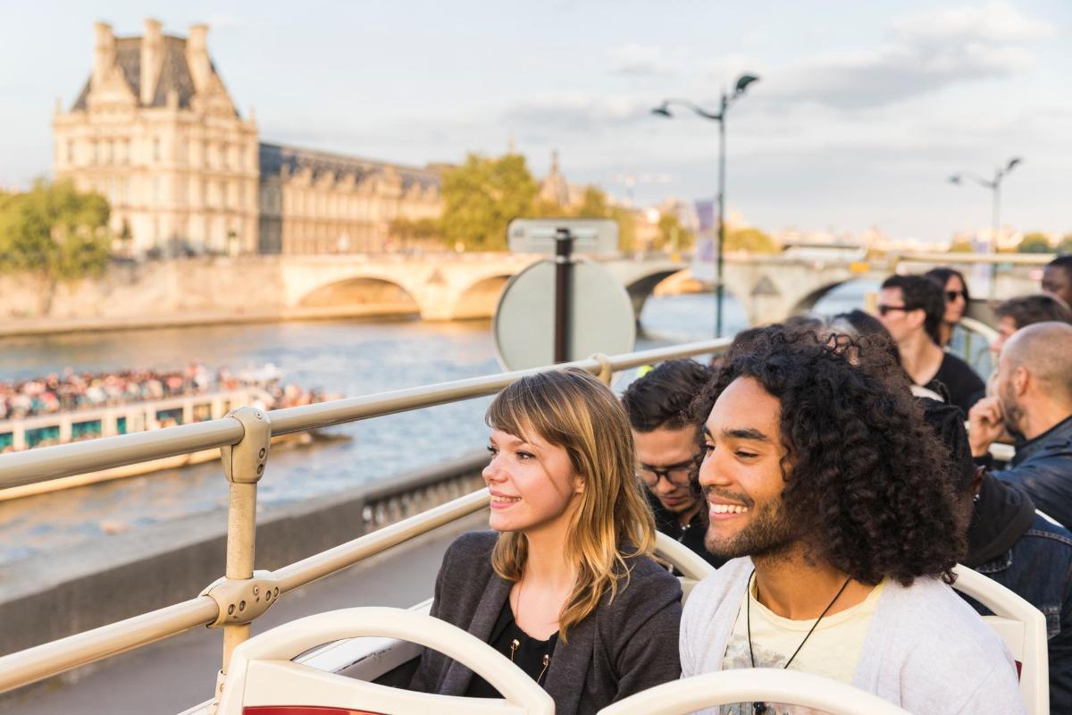 a group of people on a boat on the river
