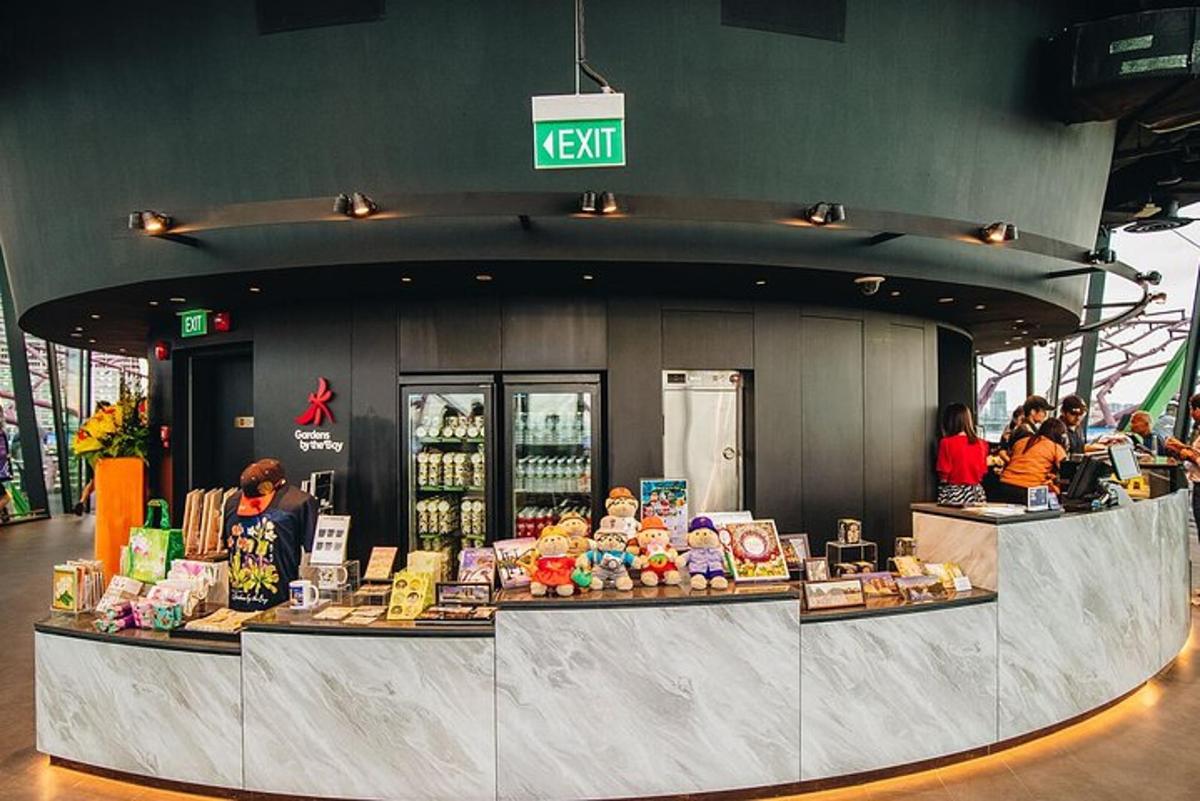 a food stand in a building with people standing around