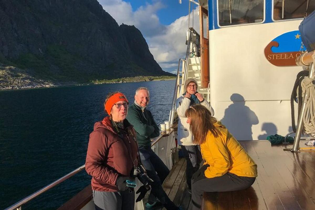 a group of people on a boat in the water