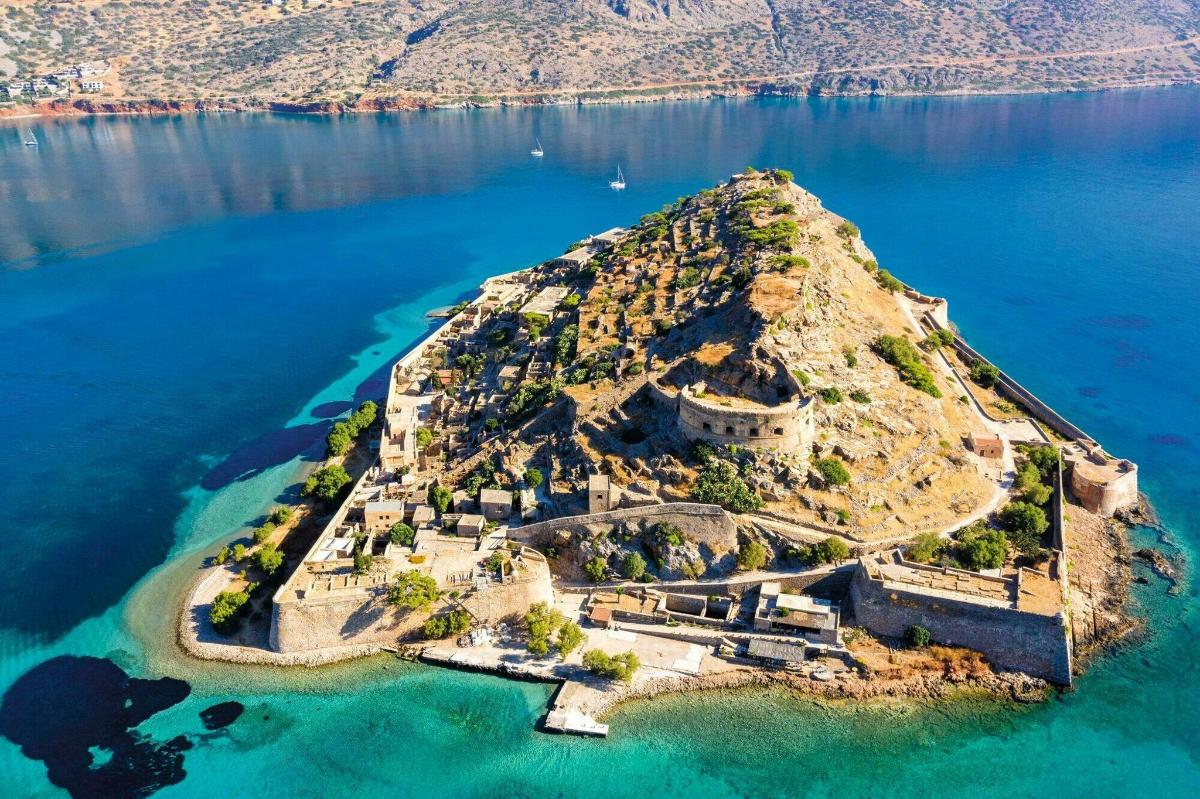 an aerial view of an island in the water