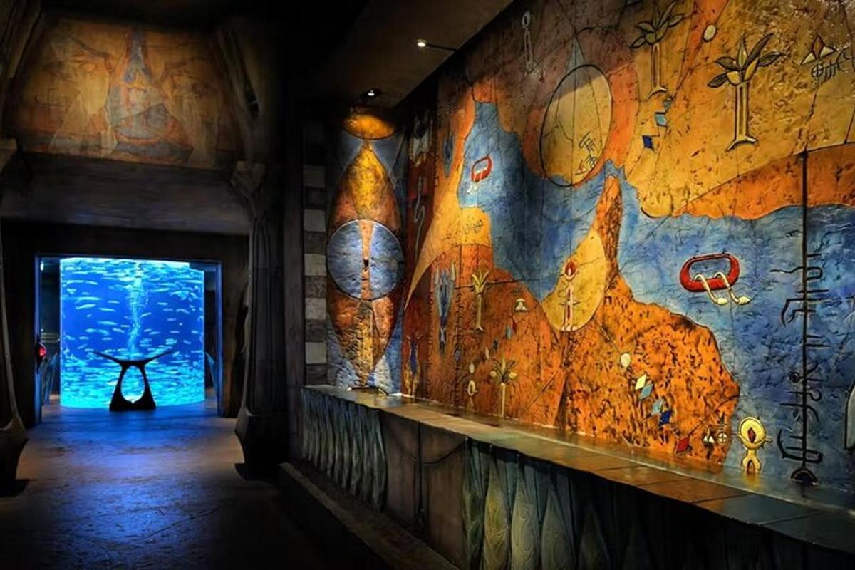 a hallway with a mural on the wall