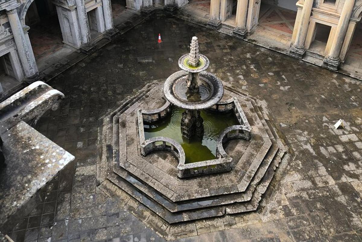 an aerial view of a fountain in a building