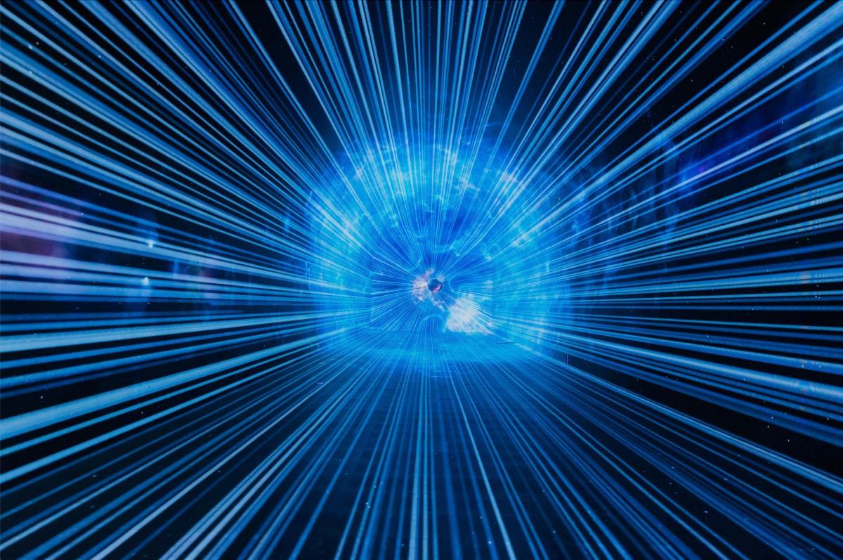 a close up of a computer screen with blue lasers