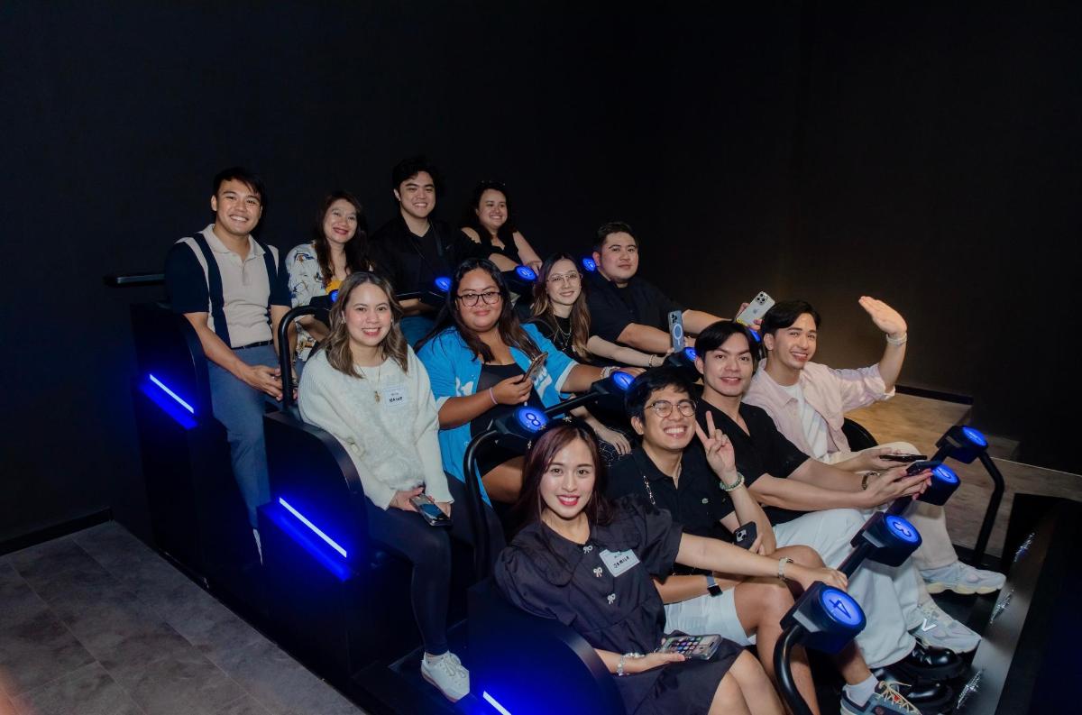 a group of people are posing for a picture