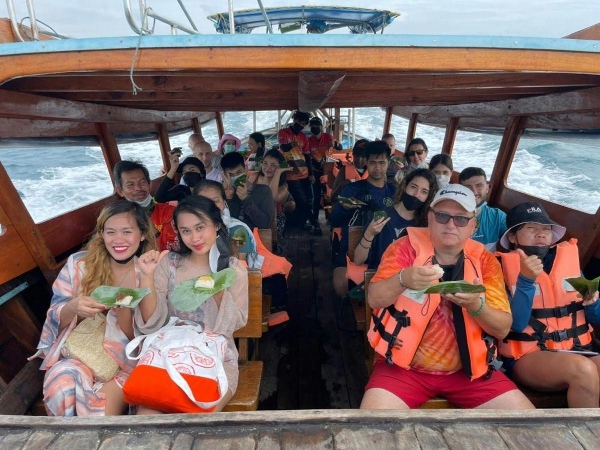 a group of people riding on a boat