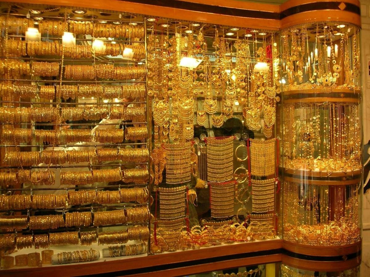 a store filled with lots of gold jewelry