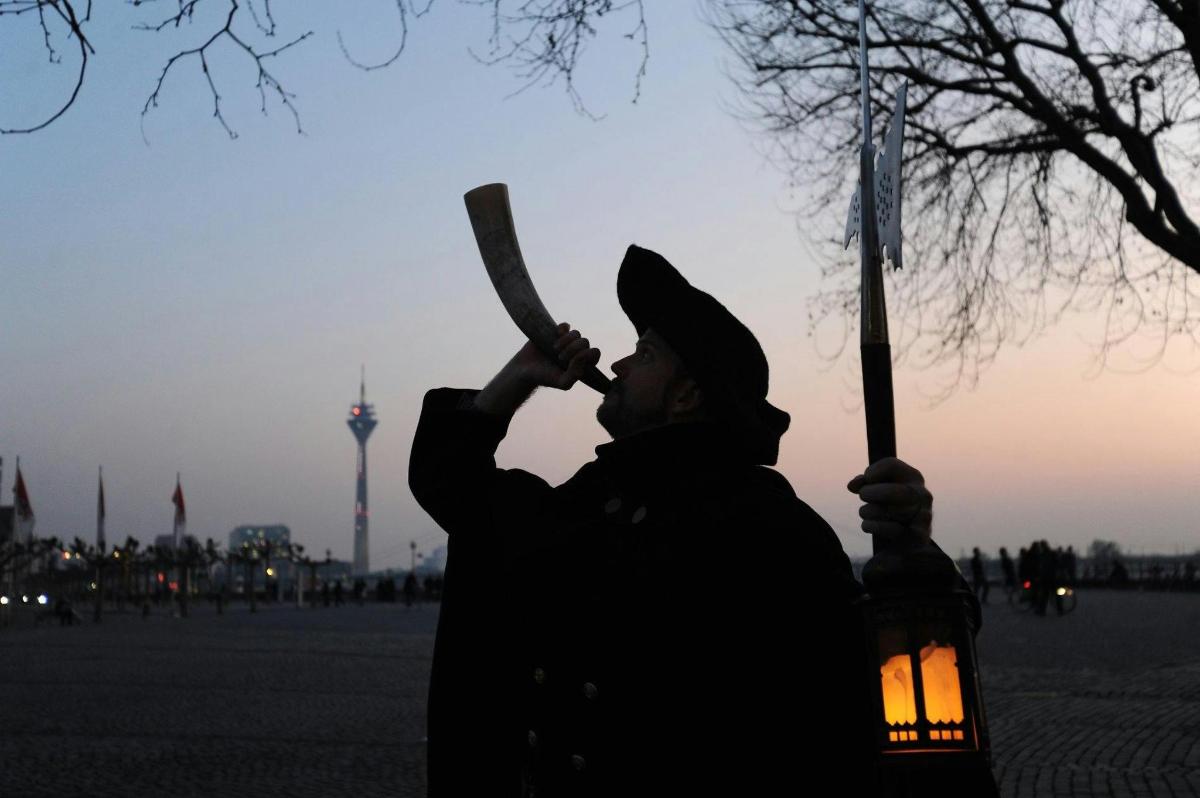 a man is holding a baseball bat