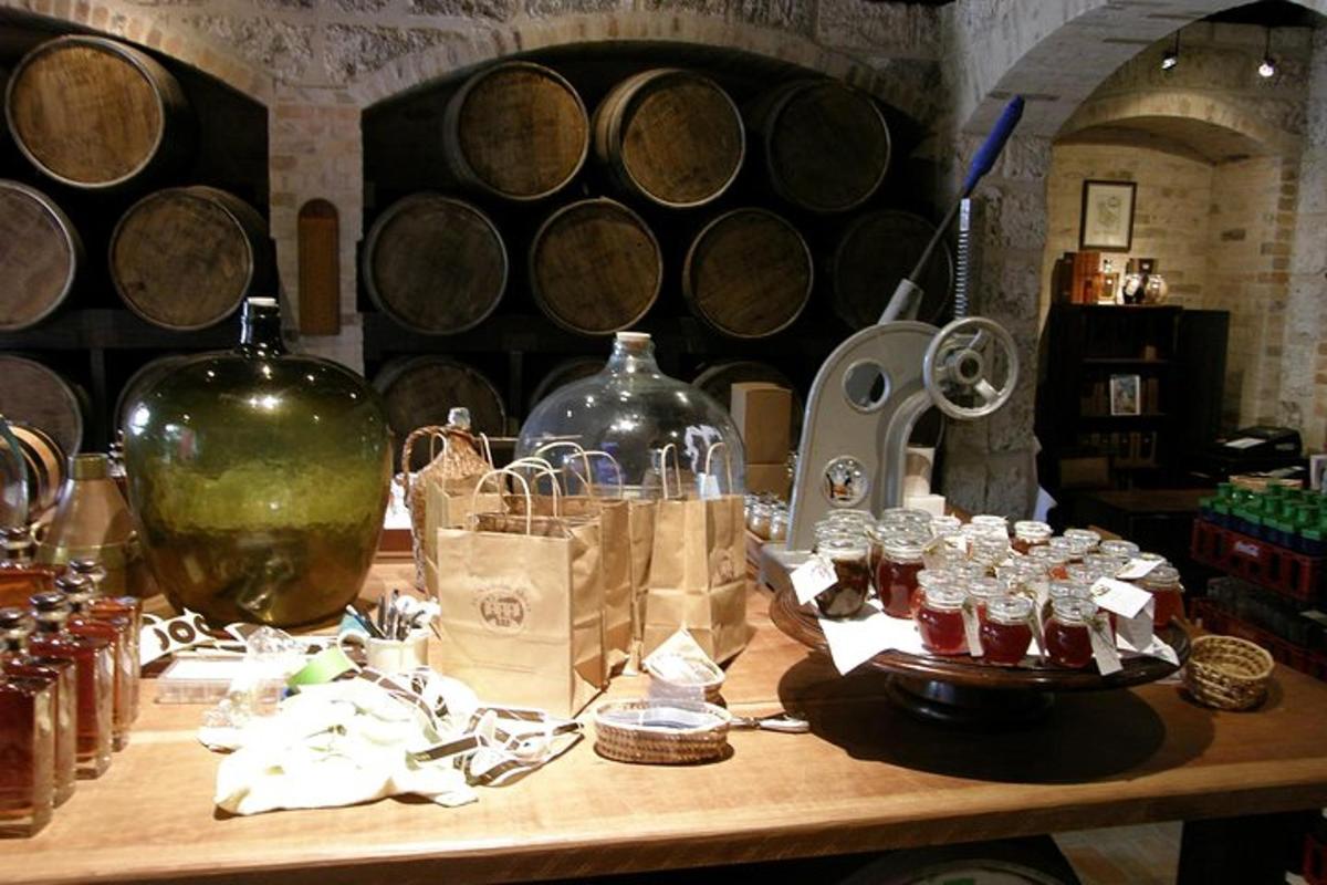 a table with bottles of wine and glasses on it