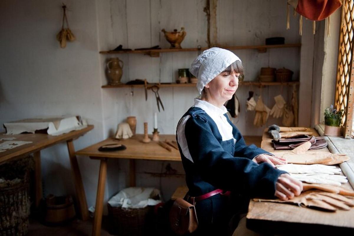 a woman sitting at a table in a room
