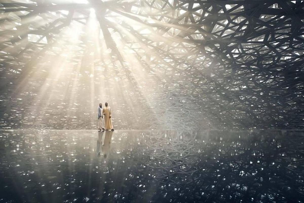 two people standing in the middle of a beam of light