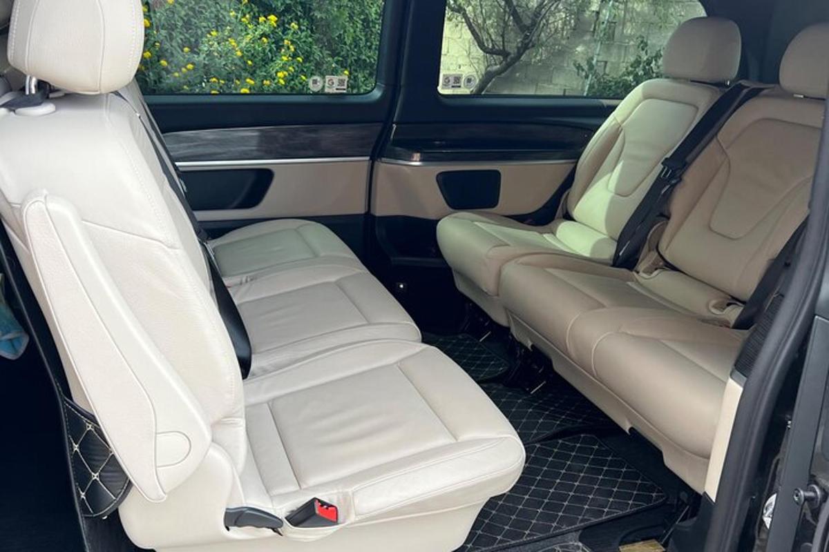 two empty seats in the back of a van