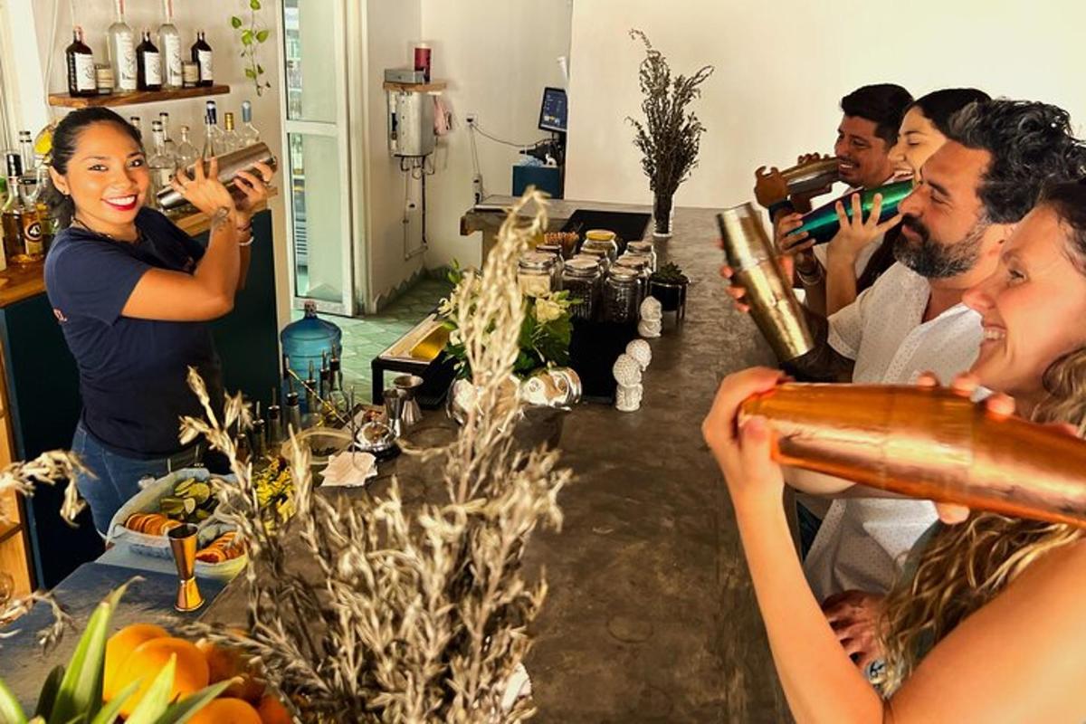 a group of people standing around a table drinking wine