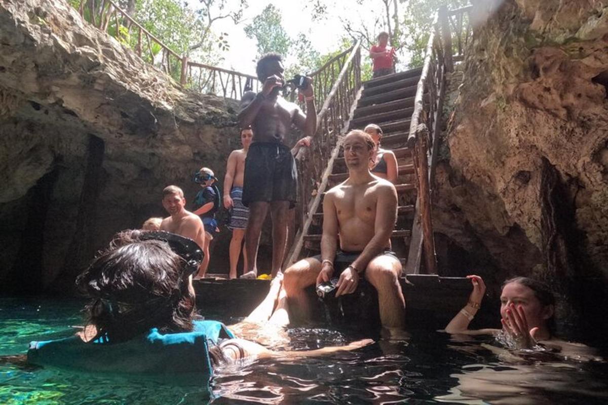 a group of people sitting in a pool of water