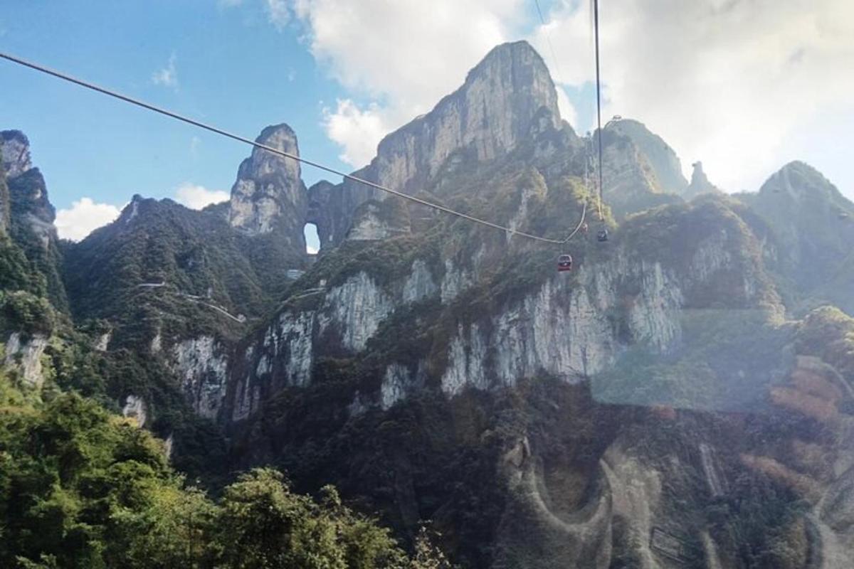 a gondola ride over the mountains in the sky