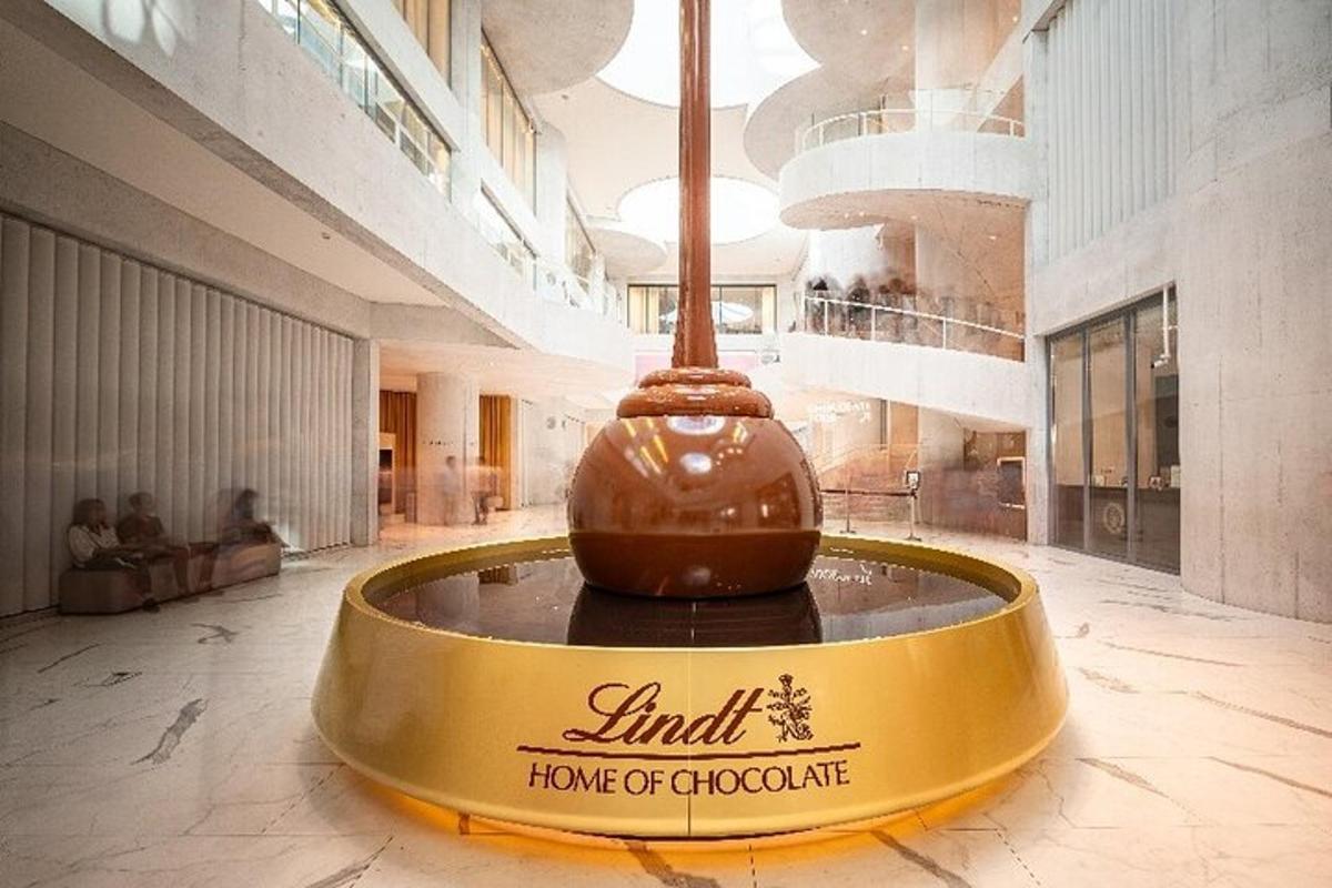 a large lobby with a chocolate fountain in the middle