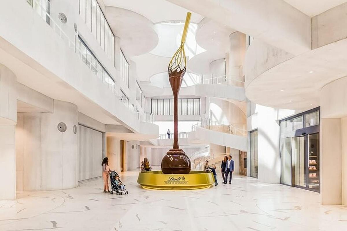 a museum with a large statue in the middle of a hall