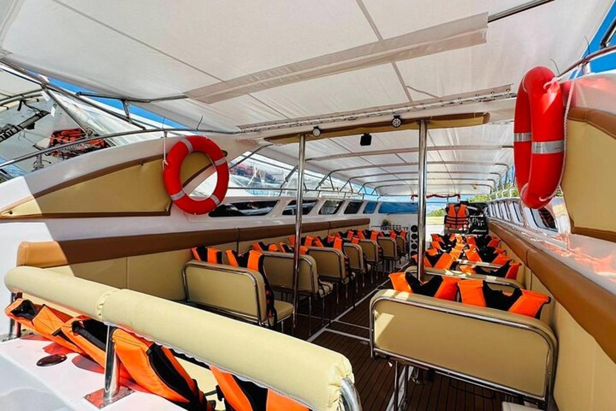 a boat with orange seats on a yacht