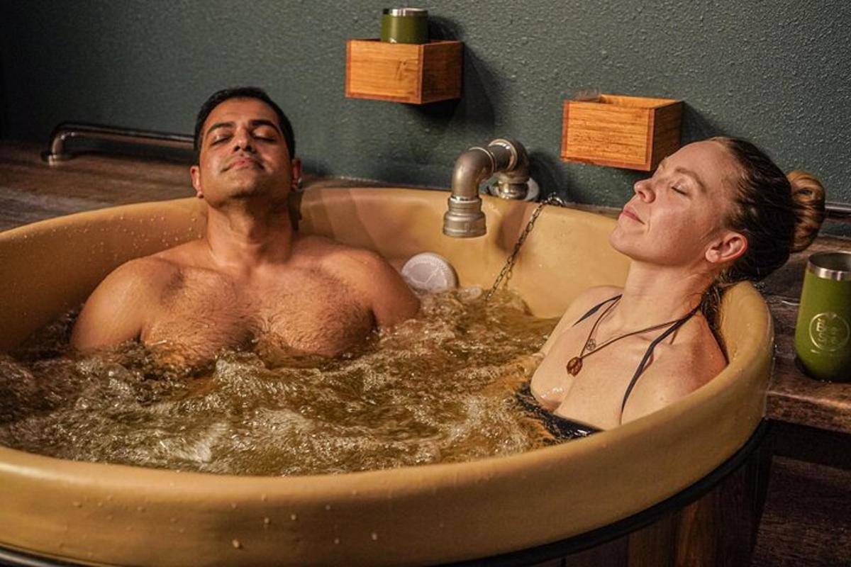 a man and a woman in a bath tub