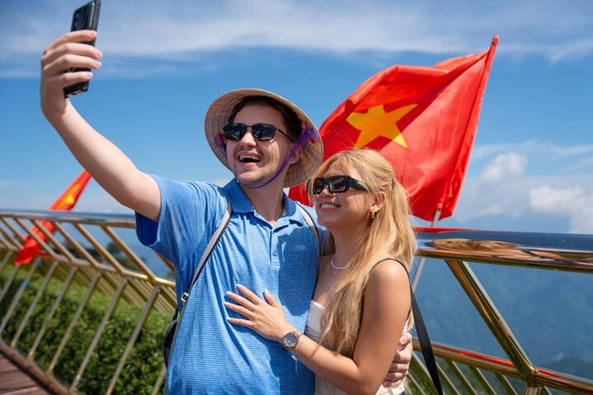 a man and a woman standing next to a flag