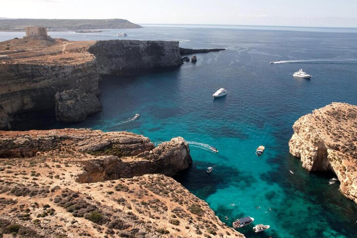 a view of a cove with boats in the water