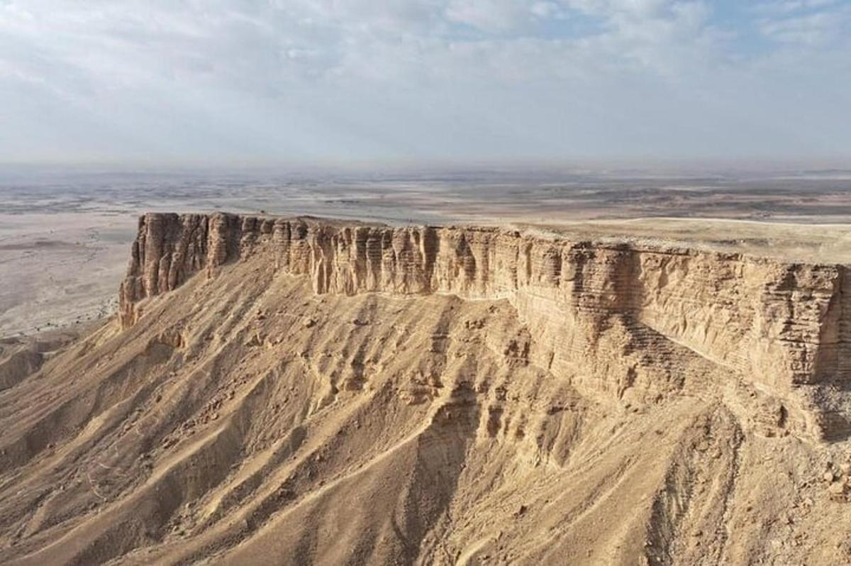 an aerial view of a mountain in the desert