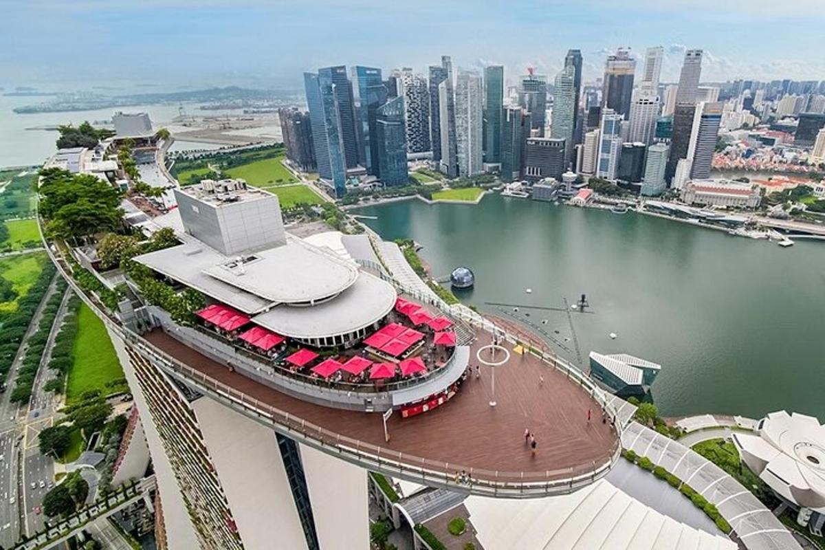 an aerial view of a city with a body of water