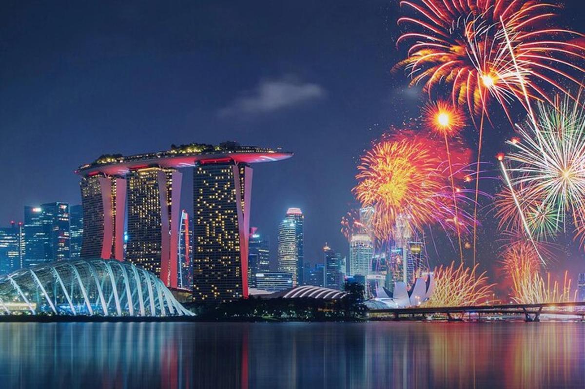 a firework display in a city with a city