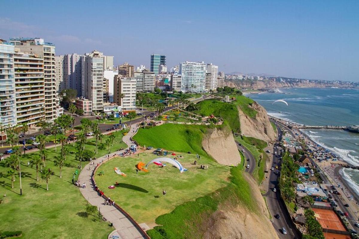 a park on the side of a cliff near the ocean