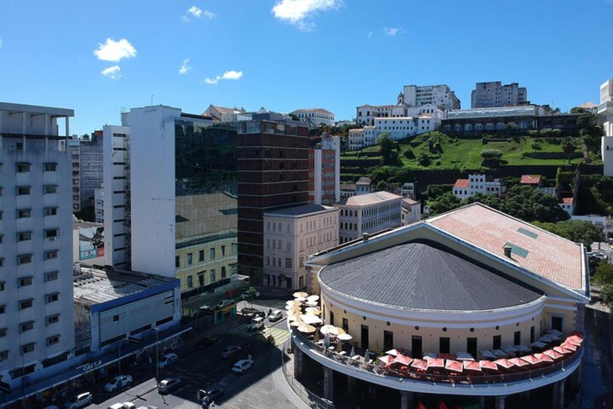 an overhead view of a city with a building
