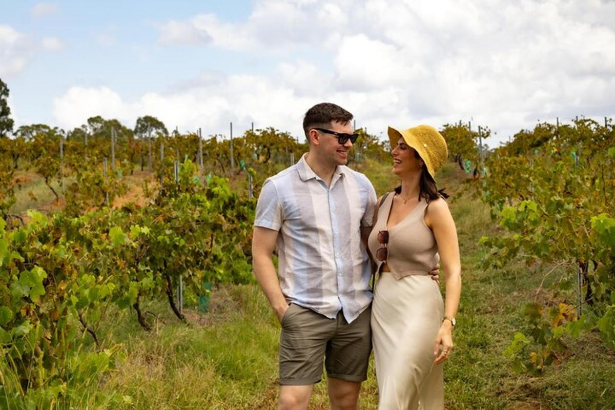a man and a woman standing in a field