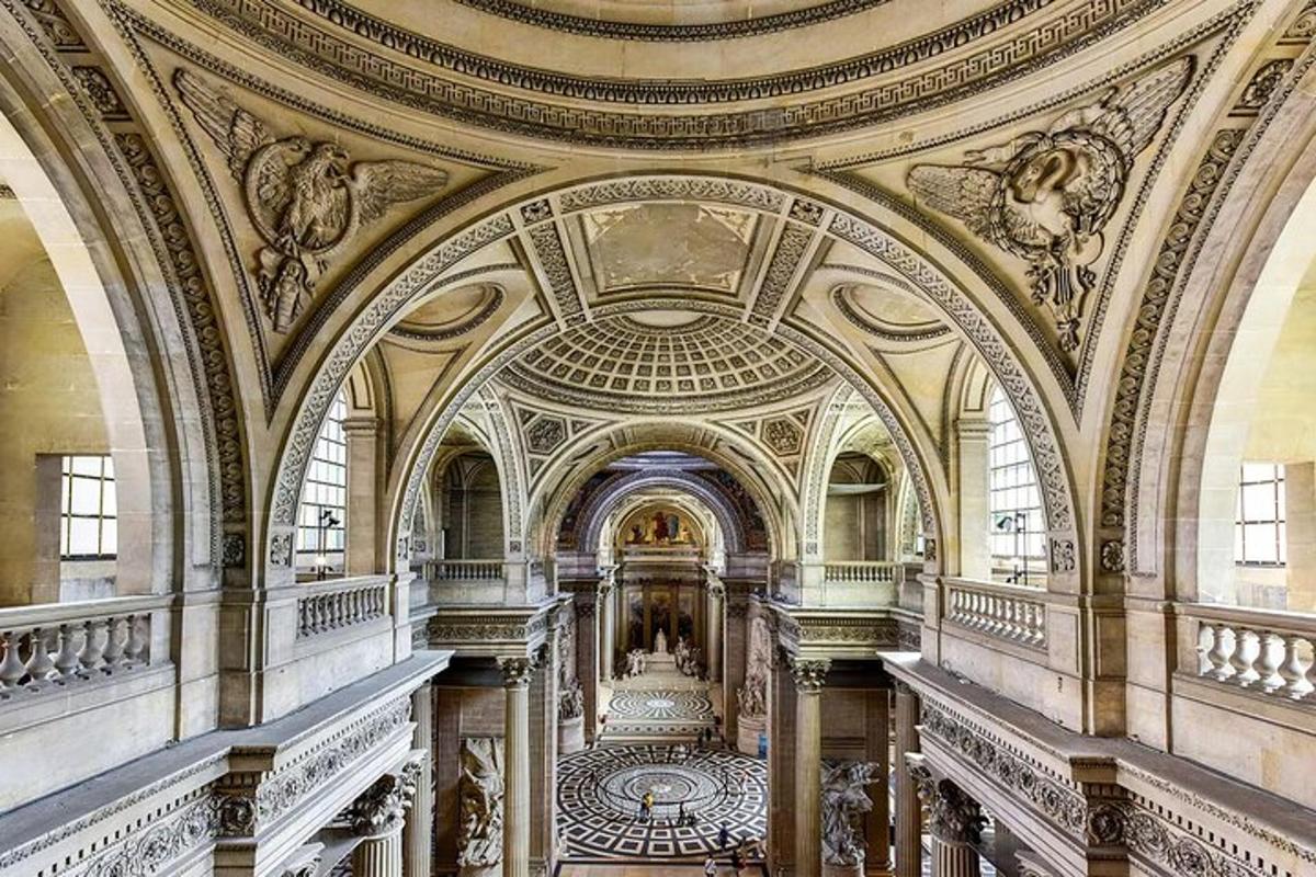 an ornate room with a staircase in a building