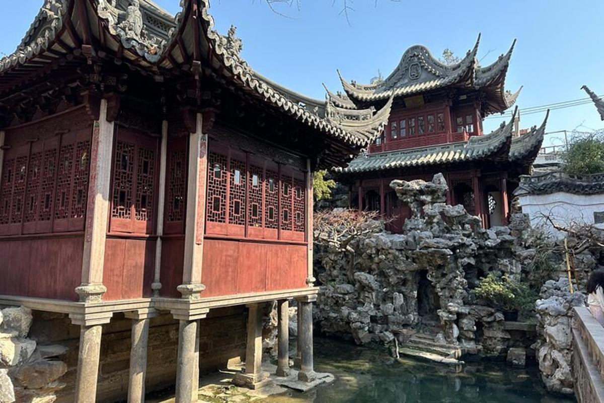 a building with a pool of water in front of it