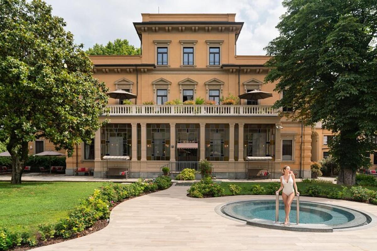 a woman in a bikini standing in front of a building