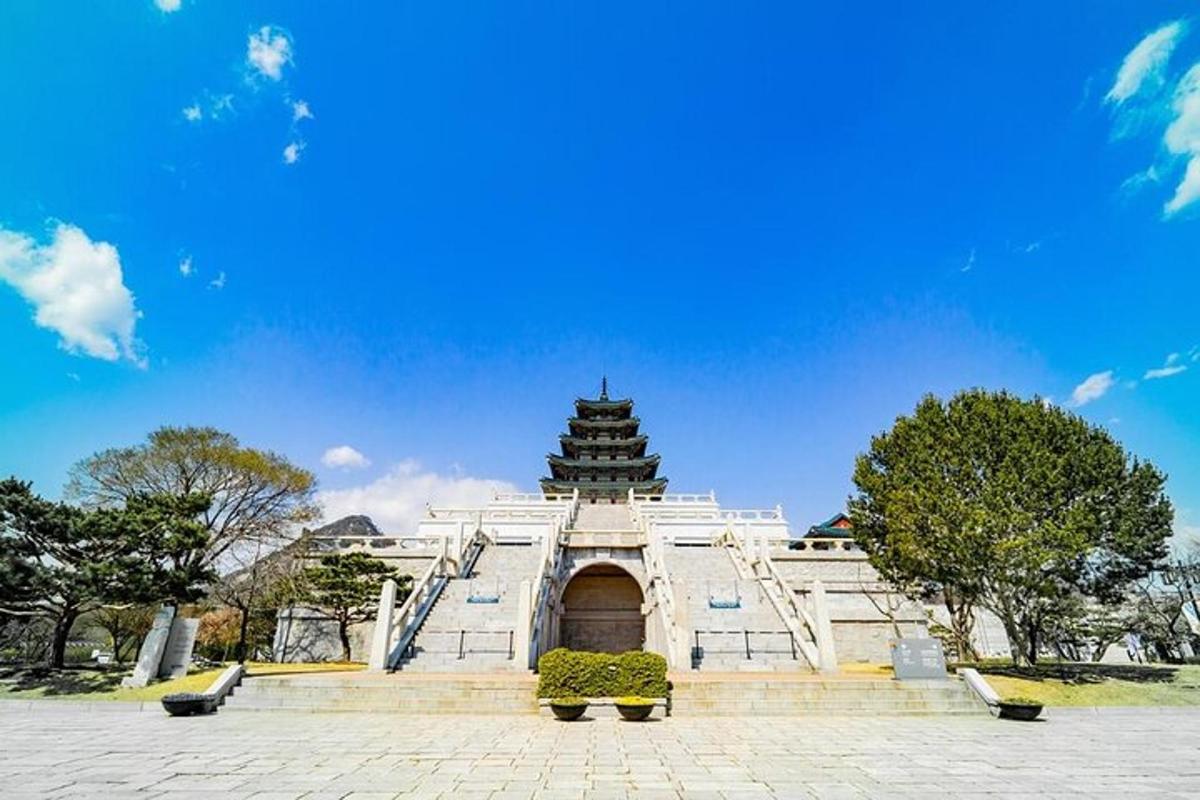 a large building with a pagoda in the background