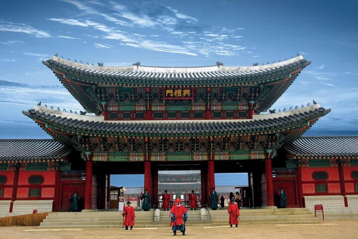 a large building with people standing in front of it