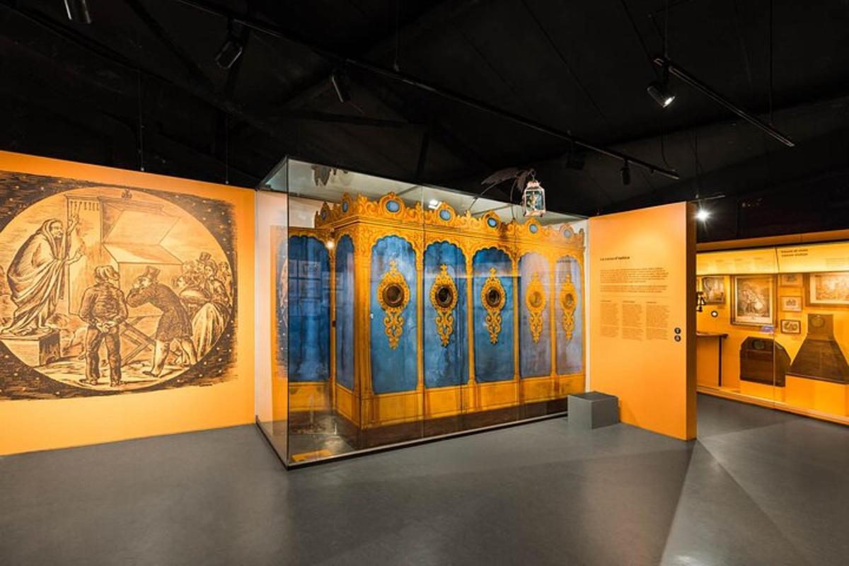 a museum exhibit with a large painting on the wall