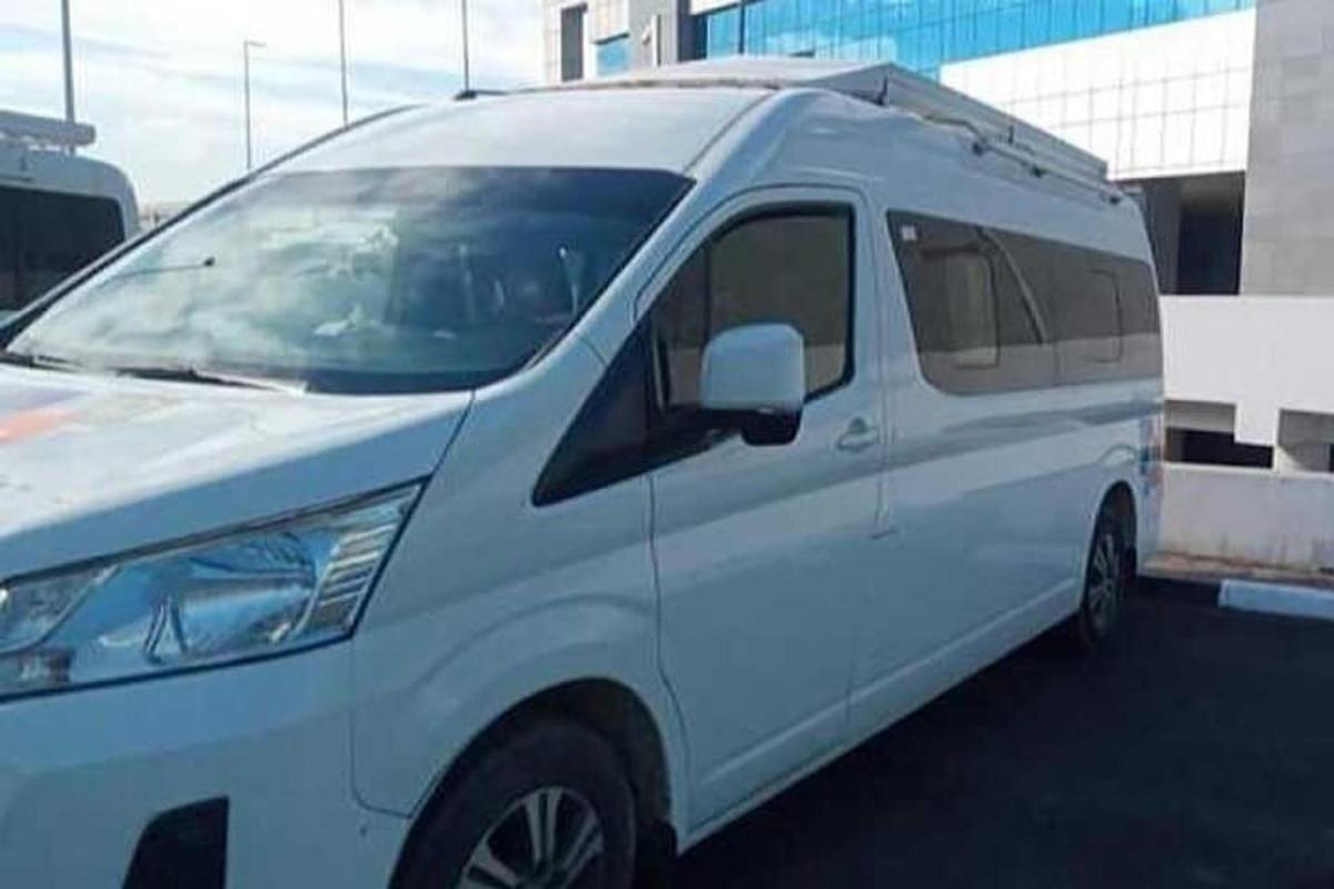 a white van parked in a parking lot