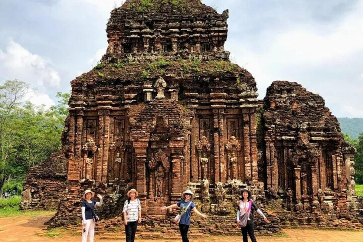 a group of children standing in front of a temple