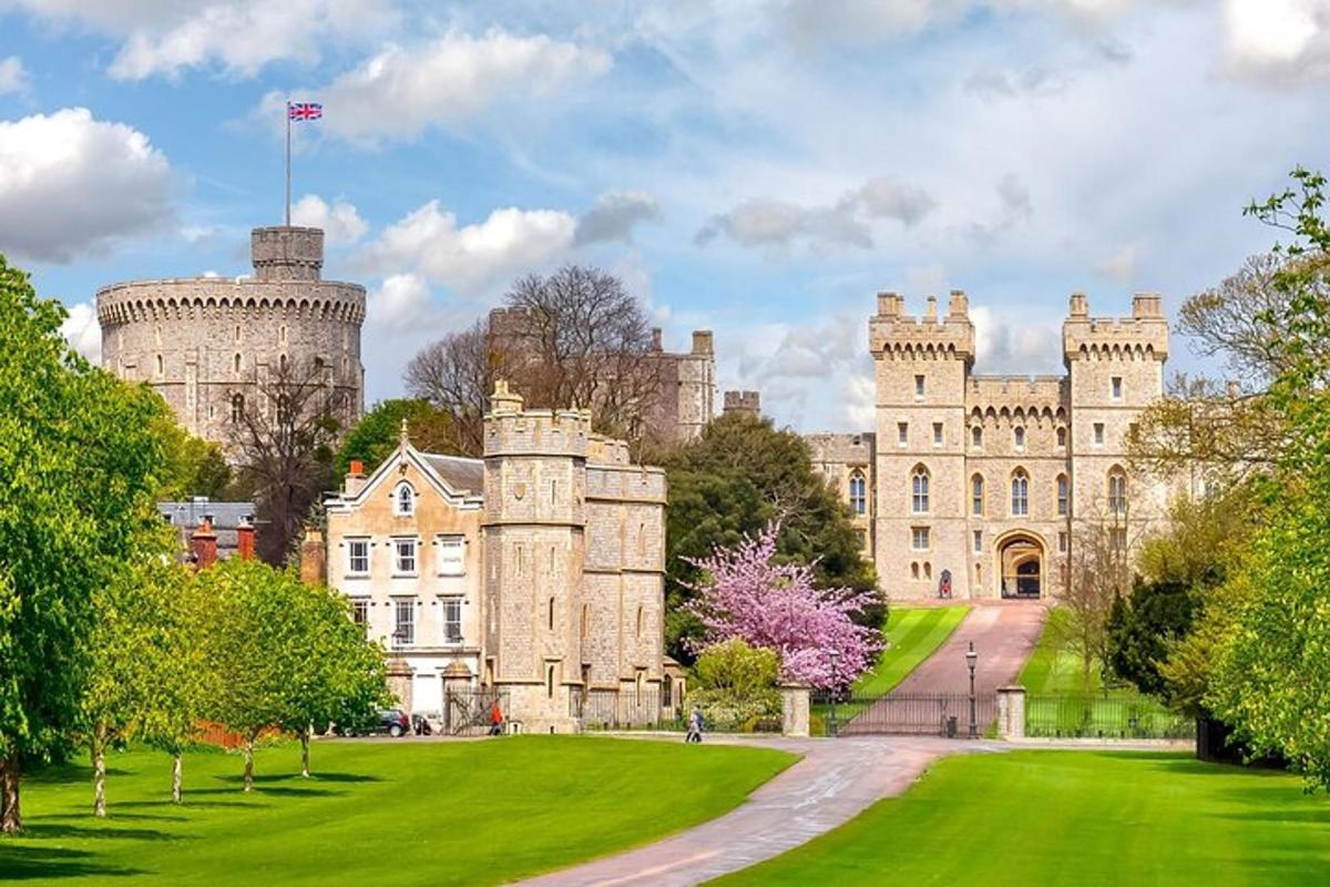 a castle with a green lawn in front of it
