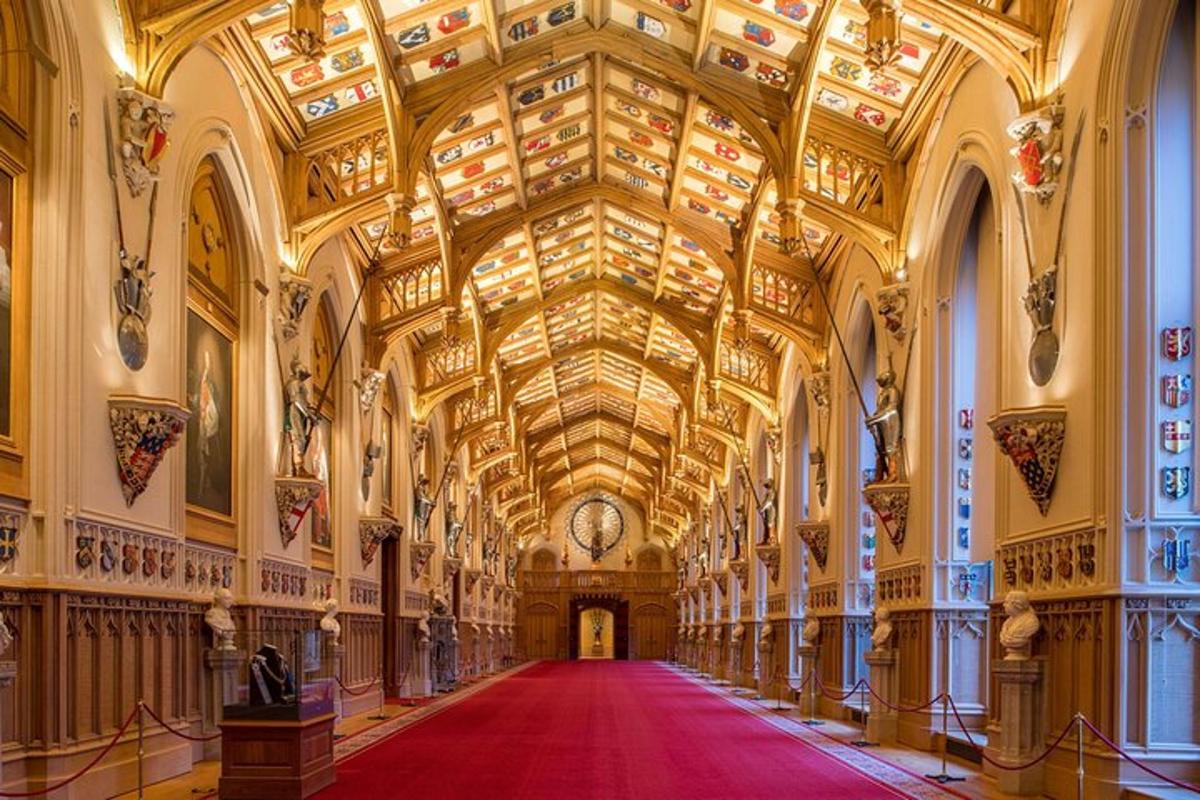a large hall with a red carpet in a building