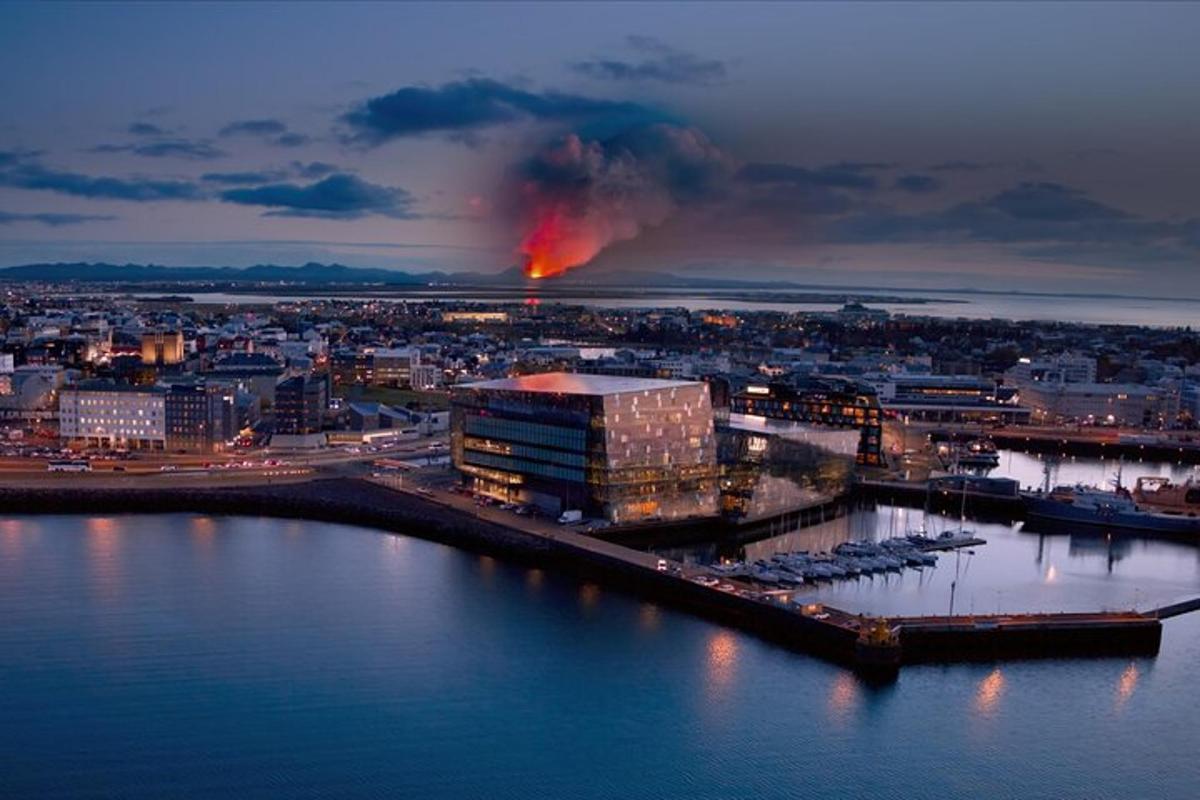 a fire is burning in a city with a building